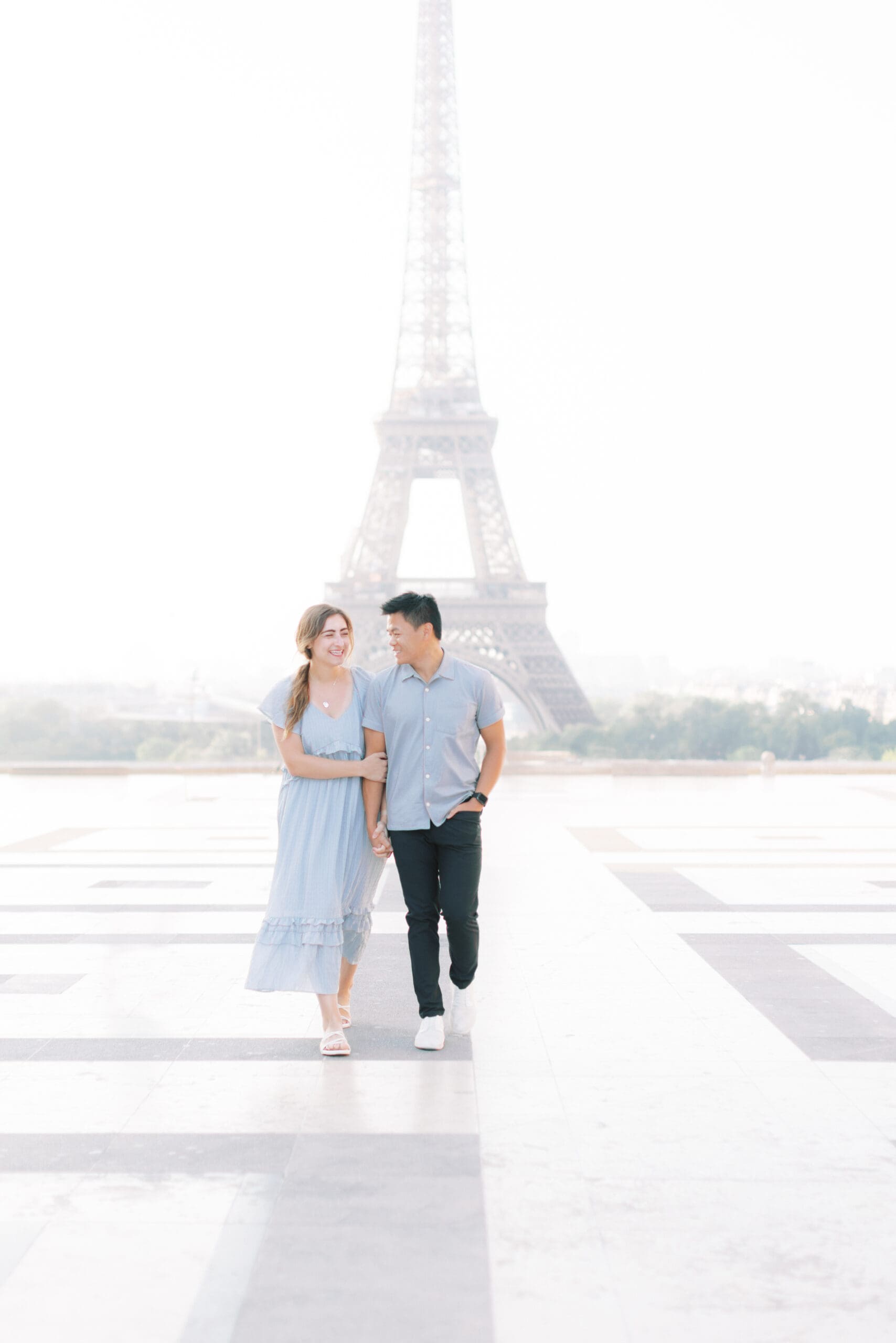 Laura and Shayne Cuong in Paris in front of the Eiffel Tower