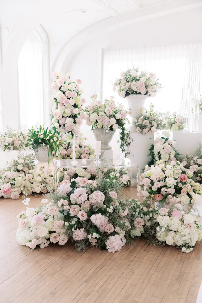 Blush and white garden floral installation for a Schimmel Ballroom wedding ceremony at The Kimpton Cottonwood