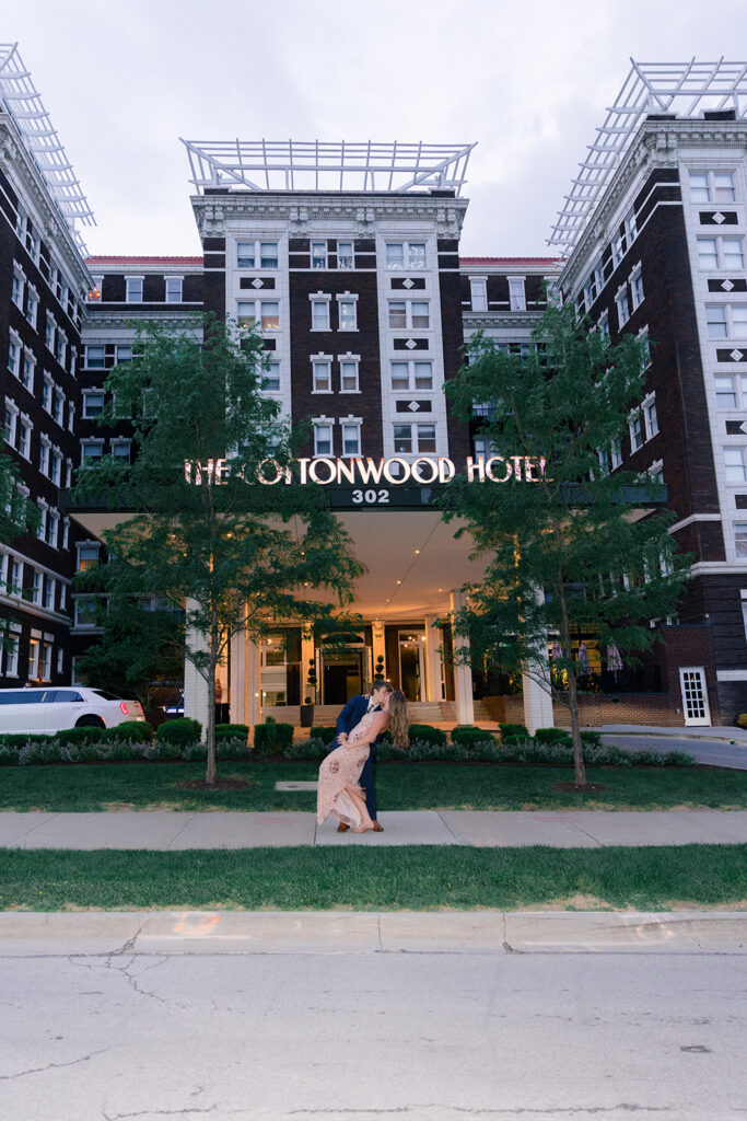 Couple outside The Kimpton Cottonwood Hotel in Omaha on the night of their wedding rehearsal